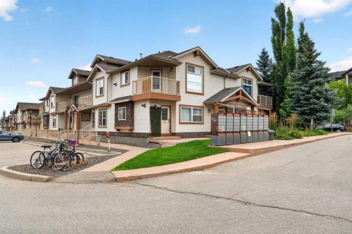 #104-20 Panatella Landing Nw, Calgary, AB - Outdoor With Facade