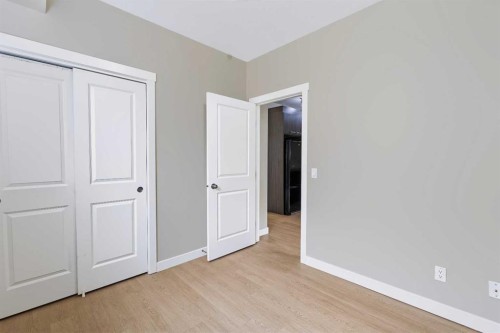 210-300 Marina Drive, Chestermere, AB - Indoor Photo Showing Other Room