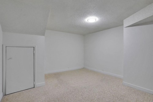 112 Martinglen Close Ne, Calgary, AB - Indoor Photo Showing Other Room