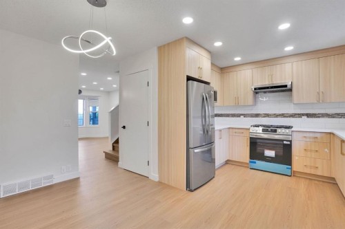 112 Martinglen Close Ne, Calgary, AB - Indoor Photo Showing Kitchen With Upgraded Kitchen