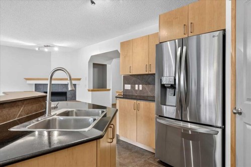 177 Royal Birch Terrace Nw, Calgary, AB - Indoor Photo Showing Kitchen With Double Sink