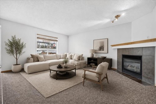 177 Royal Birch Terrace Nw, Calgary, AB - Indoor Photo Showing Living Room With Fireplace