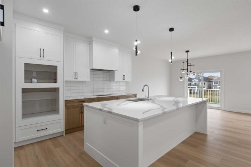 425 Montrose Green Se, High River, AB - Indoor Photo Showing Kitchen With Upgraded Kitchen