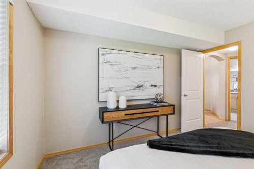 106-7 Everridge Square Sw, Calgary, AB - Indoor Photo Showing Bedroom