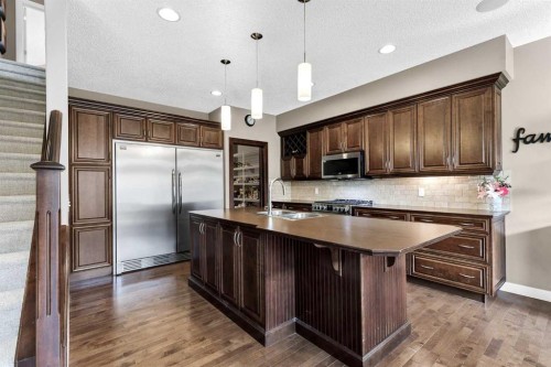 103 Tuscany Estates Crescent Nw, Calgary, AB - Indoor Photo Showing Kitchen With Stainless Steel Kitchen With Double Sink With Upgraded Kitchen