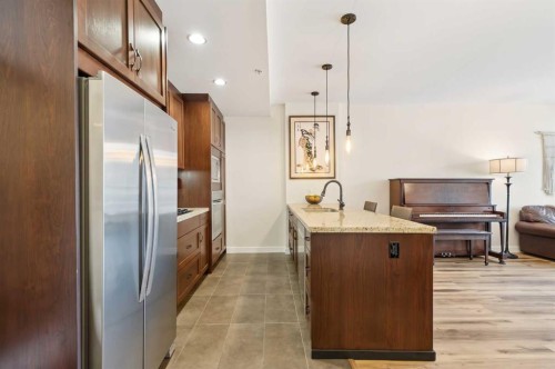 204-540 34 Street Nw, Calgary, AB - Indoor Photo Showing Kitchen With Double Sink
