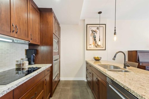 204-540 34 Street Nw, Calgary, AB - Indoor Photo Showing Kitchen With Stainless Steel Kitchen With Upgraded Kitchen
