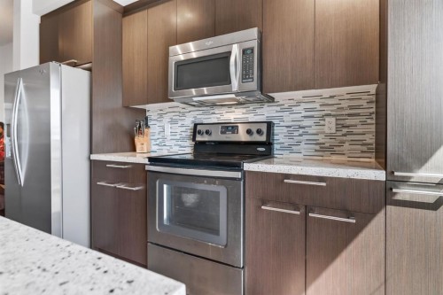 355 Silverado Common Sw, Calgary, AB - Indoor Photo Showing Kitchen With Stainless Steel Kitchen