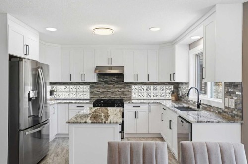 12078 Diamond View Se, Calgary, AB - Indoor Photo Showing Kitchen With Stainless Steel Kitchen With Double Sink With Upgraded Kitchen