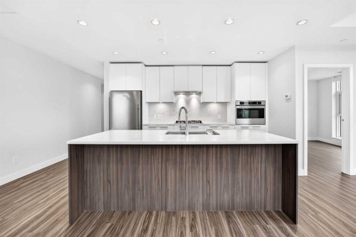 704-530 3 Street Se, Calgary, AB - Indoor Photo Showing Kitchen With Stainless Steel Kitchen With Upgraded Kitchen