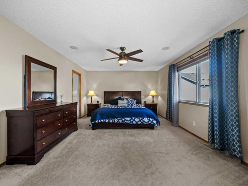 108 Pantego Rise Nw, Calgary, AB - Indoor Photo Showing Bedroom
