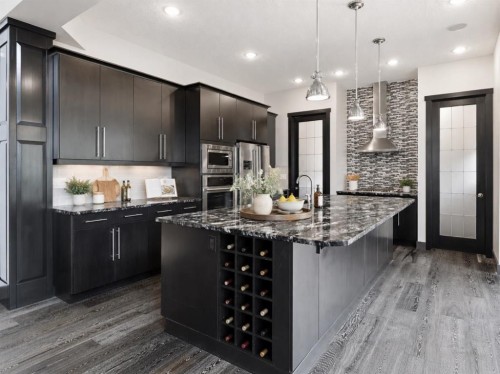8243 Fortress Drive Sw, Calgary, AB - Indoor Photo Showing Kitchen With Stainless Steel Kitchen With Upgraded Kitchen