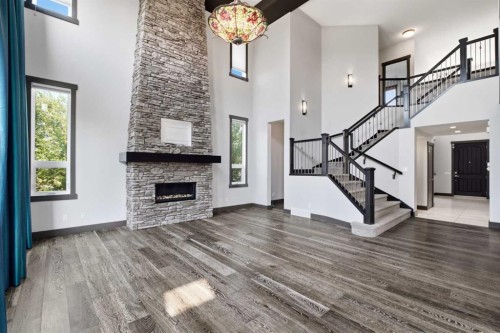 8243 Fortress Drive Sw, Calgary, AB - Indoor With Fireplace