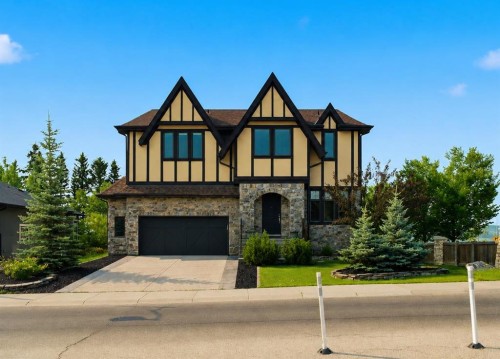8243 Fortress Drive Sw, Calgary, AB - Outdoor With Facade