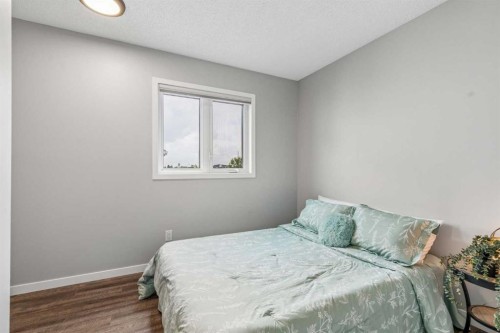 230 Mt Lorette Place Se, Calgary, AB - Indoor Photo Showing Bedroom