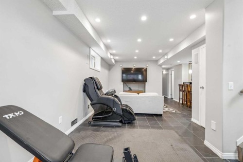 230 Mt Lorette Place Se, Calgary, AB - Indoor Photo Showing Gym Room