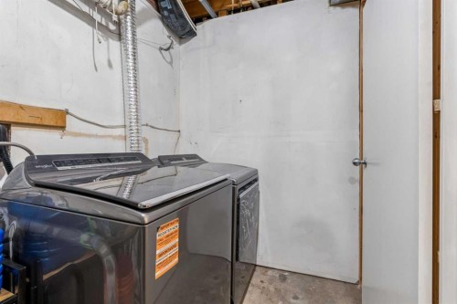 230 Mt Lorette Place Se, Calgary, AB - Indoor With Storage