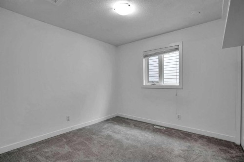 51 Del Monica Place Ne, Calgary, AB - Indoor Photo Showing Other Room