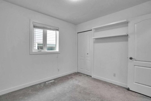 51 Del Monica Place Ne, Calgary, AB - Indoor Photo Showing Other Room