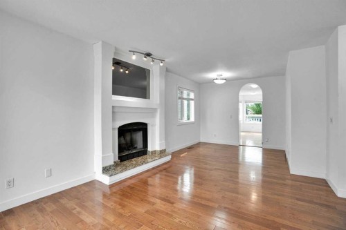 51 Del Monica Place Ne, Calgary, AB - Indoor Photo Showing Living Room With Fireplace