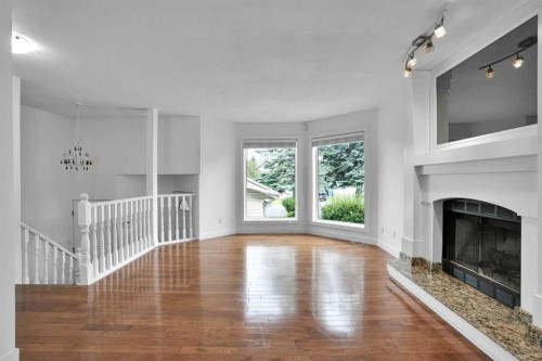 51 Del Monica Place Ne, Calgary, AB - Indoor Photo Showing Living Room With Fireplace