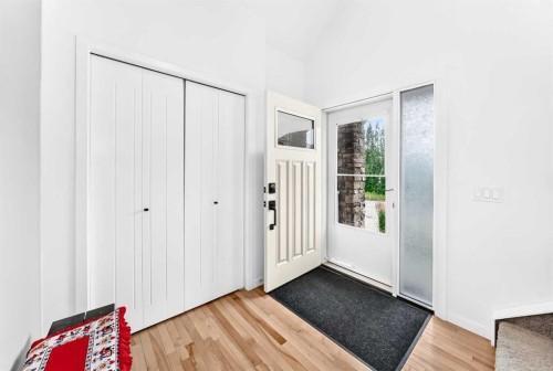 64 Sunset Square, Cochrane, AB - Indoor Photo Showing Other Room