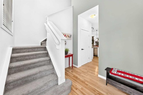 64 Sunset Square, Cochrane, AB - Indoor Photo Showing Other Room
