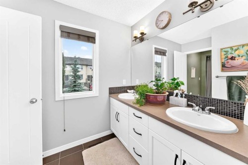 64 Sunset Square, Cochrane, AB - Indoor Photo Showing Bathroom