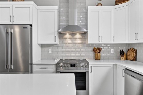 163 Copperleaf Way Se, Calgary, AB - Indoor Photo Showing Kitchen With Stainless Steel Kitchen