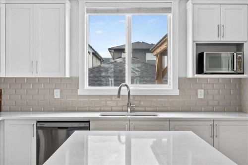 163 Copperleaf Way Se, Calgary, AB - Indoor Photo Showing Kitchen With Upgraded Kitchen