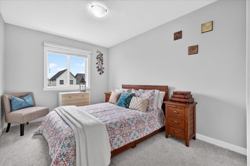 163 Copperleaf Way Se, Calgary, AB - Indoor Photo Showing Bedroom
