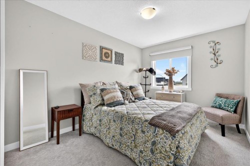 163 Copperleaf Way Se, Calgary, AB - Indoor Photo Showing Bedroom