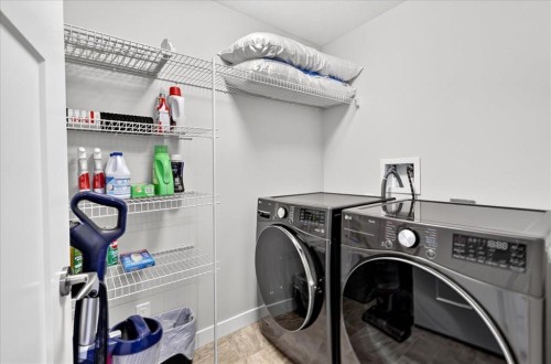 163 Copperleaf Way Se, Calgary, AB - Indoor Photo Showing Laundry Room