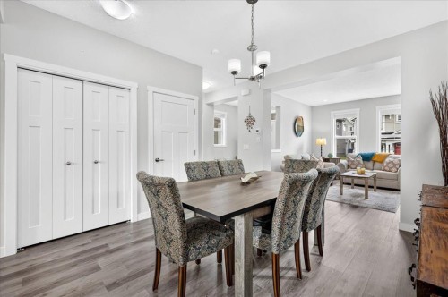 163 Copperleaf Way Se, Calgary, AB - Indoor Photo Showing Dining Room