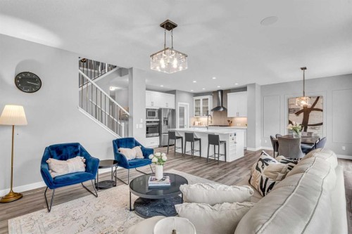49 Creekside Avenue Sw, Calgary, AB - Indoor Photo Showing Living Room