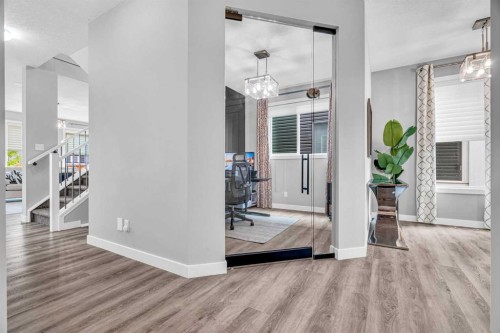 49 Creekside Avenue Sw, Calgary, AB - Indoor Photo Showing Other Room