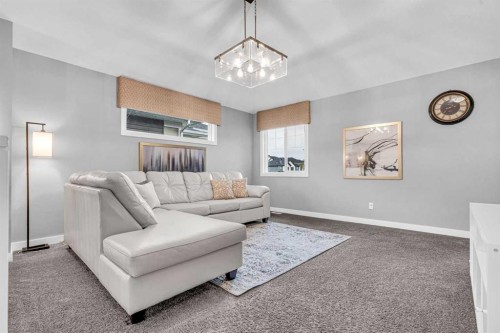 49 Creekside Avenue Sw, Calgary, AB - Indoor Photo Showing Living Room