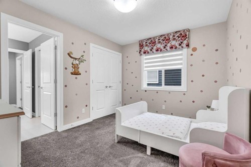 49 Creekside Avenue Sw, Calgary, AB - Indoor Photo Showing Other Room