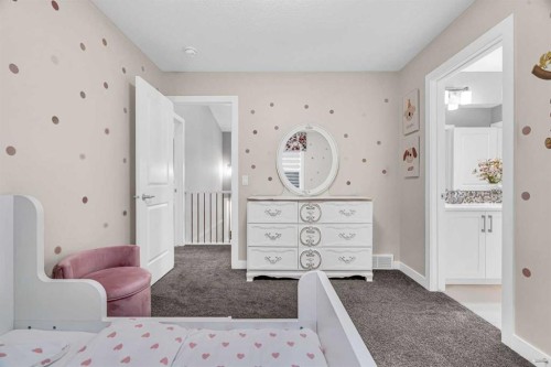 49 Creekside Avenue Sw, Calgary, AB - Indoor Photo Showing Other Room