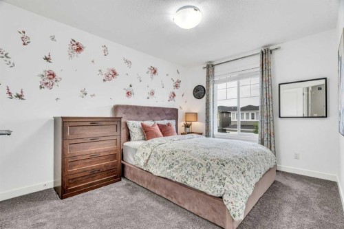 49 Creekside Avenue Sw, Calgary, AB - Indoor Photo Showing Bedroom