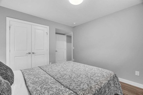 49 Creekside Avenue Sw, Calgary, AB - Indoor Photo Showing Bedroom