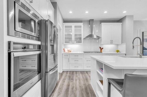 49 Creekside Avenue Sw, Calgary, AB - Indoor Photo Showing Kitchen With Upgraded Kitchen