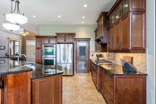 22 Tuscany Estates Crescent Nw, Calgary, AB - Indoor Photo Showing Kitchen With Upgraded Kitchen
