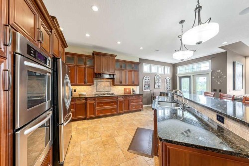 22 Tuscany Estates Crescent Nw, Calgary, AB - Indoor Photo Showing Kitchen With Upgraded Kitchen