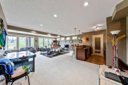 22 Tuscany Estates Crescent Nw, Calgary, AB - Indoor Photo Showing Gym Room