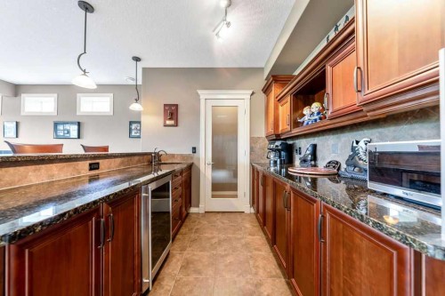22 Tuscany Estates Crescent Nw, Calgary, AB - Indoor Photo Showing Kitchen With Double Sink