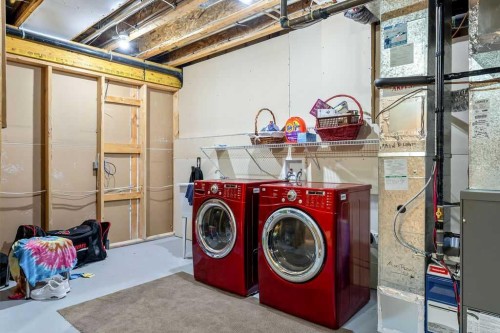 22 Tuscany Estates Crescent Nw, Calgary, AB - Indoor Photo Showing Laundry Room