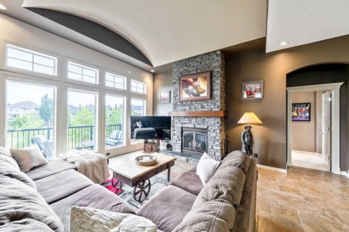 22 Tuscany Estates Crescent Nw, Calgary, AB - Indoor Photo Showing Living Room With Fireplace