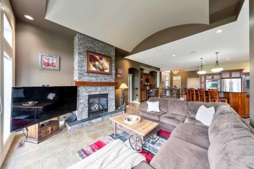 22 Tuscany Estates Crescent Nw, Calgary, AB - Indoor Photo Showing Living Room With Fireplace