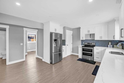 2046 33 Street Se, Calgary, AB - Indoor Photo Showing Kitchen With Double Sink